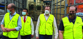 Employee Scott taking Hon Ed Husic and Sam Lin (Candidate for Tangney) through warehouse with CEO Kane